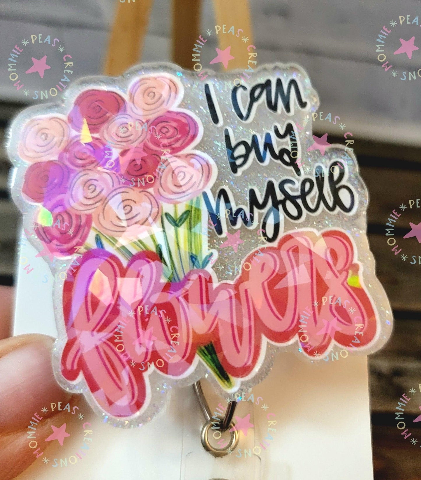 Glittery badge with pink roses and text I can buy myself flowers in colorful script