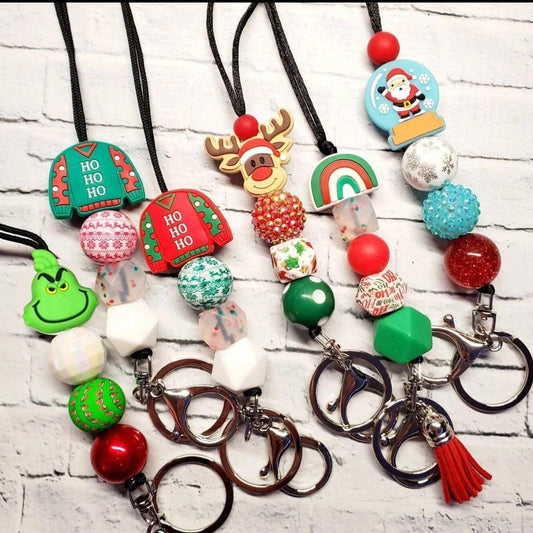 Colorful handmade Christmas lanyards and badge reels with festive beads and charms, unique gifts