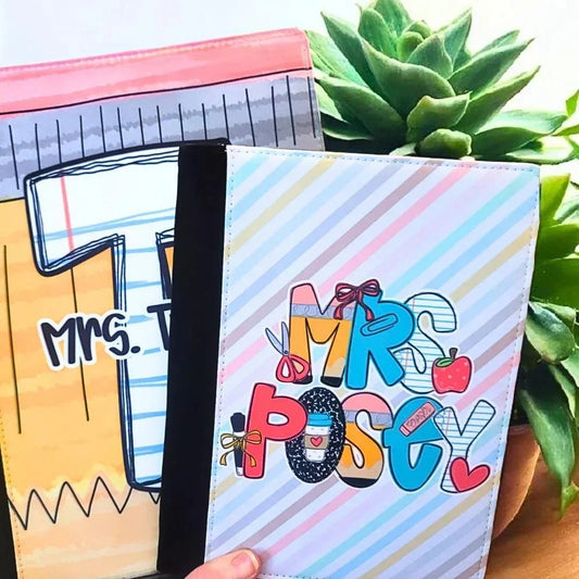 Mommie Peas Creations personalized teacher padfolio with pastel stripes and colorful "Mrs. Posty" lettering featuring school supplies.