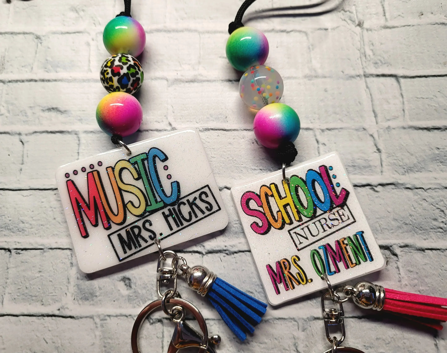 Mommie Peas Creations rainbow leopard print lanyard with silicone beads and custom name tags for teachers.