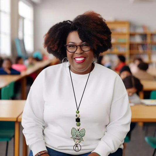 Example of Teacher with bow lanyard sitting in classroom