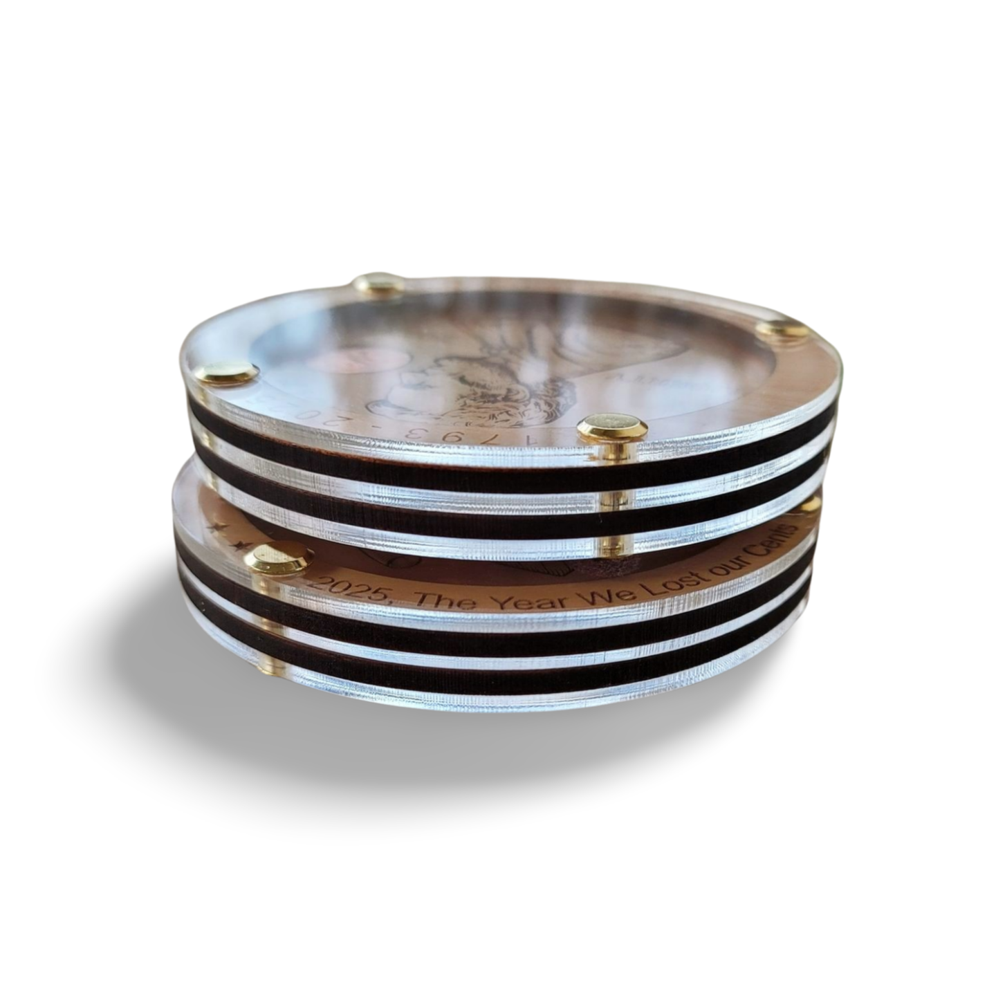 Stacked round acrylic coasters with gold screws and layered black, white, and bronze accents, handmade gift