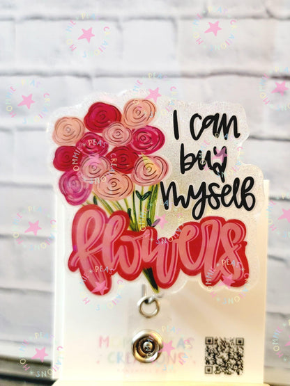 Colorful bouquet of pink and red flowers with text "I can buy myself flowers" on glittery badge
