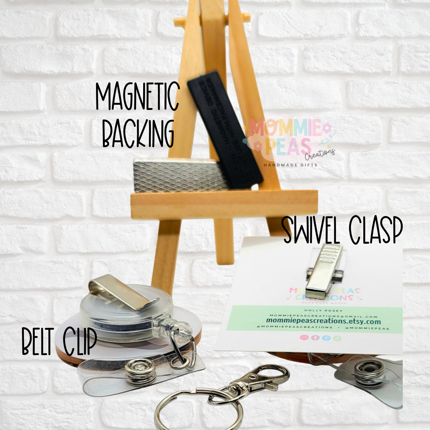 Display of badge reels with magnetic backing, swivel clasp, and belt clip on wooden easel