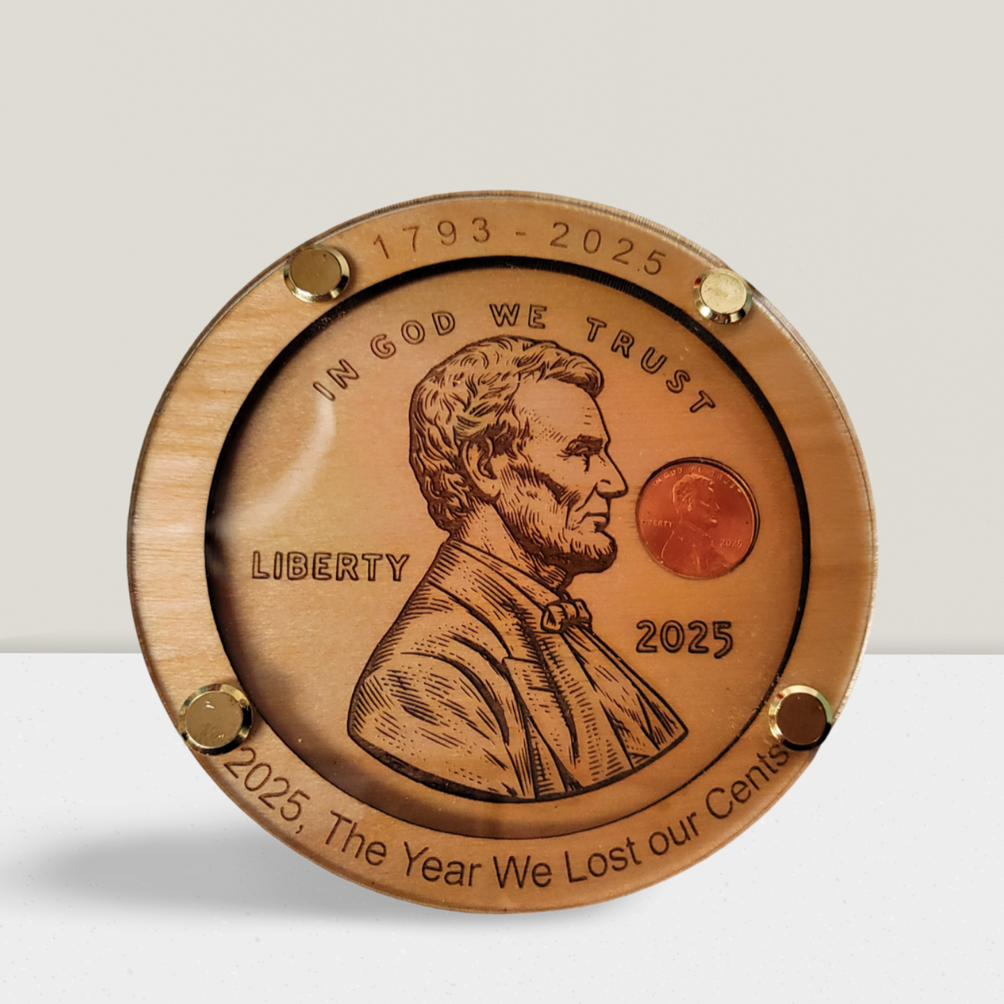 Handmade wooden penny coaster featuring copper and bronze tones, unique gift item.