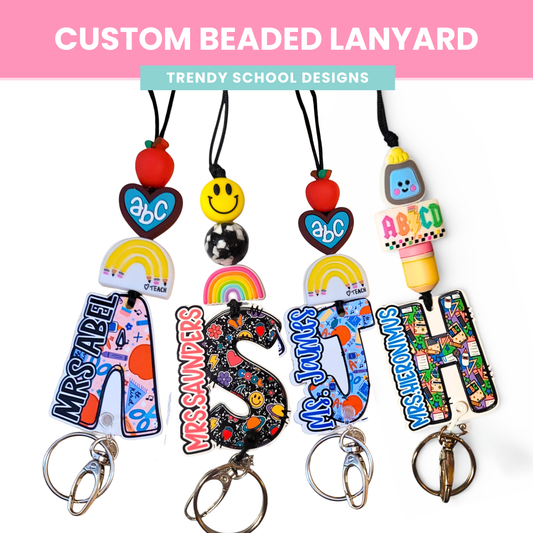 Four personalized teacher lanyards featuring custom patterned acrylic letters A, S, J, and H. Designs include school tools, retro florals, and smiley faces, personalized with names like Mrs. Abel and Ms. James, accented by colorful silicone beads and charms.