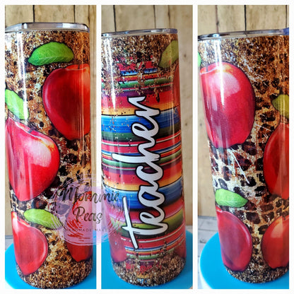 Tumbler with red apples, green leaves, rustic texture, and colorful stripes with 'teacher' text
