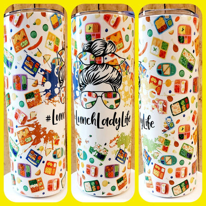 White tumbler with colorful lunchbox pattern and #LunchLadyLife text featuring a woman with bun and sunglasses