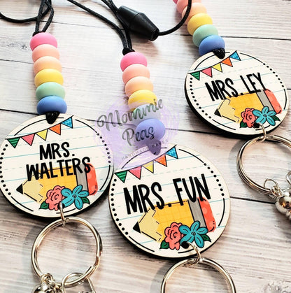 Colorful teacher keychains with pastel beads and names Mrs. Walters, Mrs. Fun, and Mrs. Ley