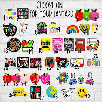Collection of 40 colorful teaching-themed lanyard charms including apples, books, crayons, science, and inspirational quotes