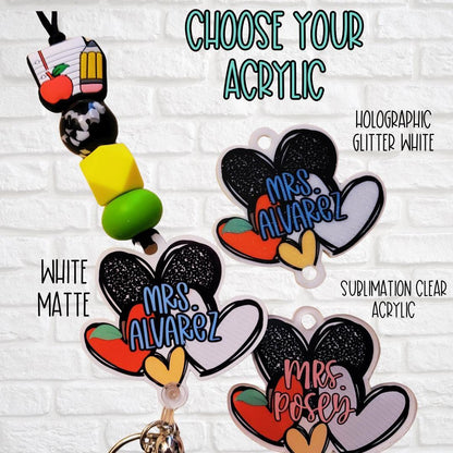 Custom keychains with teacher-themed acrylic charms in white matte, holographic glitter, and clear sublimation styles