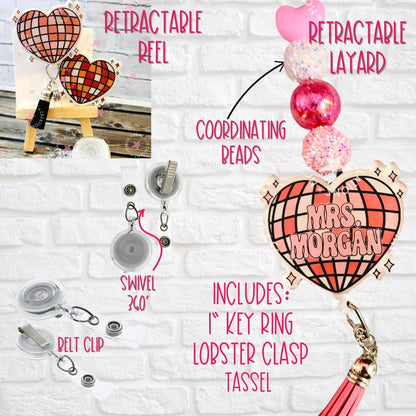 Pink and red plaid heart retractable reel badge holder with customizable name, coordinating beads, and tassel