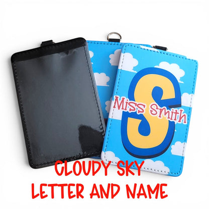 Mommie Peas Creations personalized Toy Story inspired ID badge holder with blue cloudy sky design and custom name.