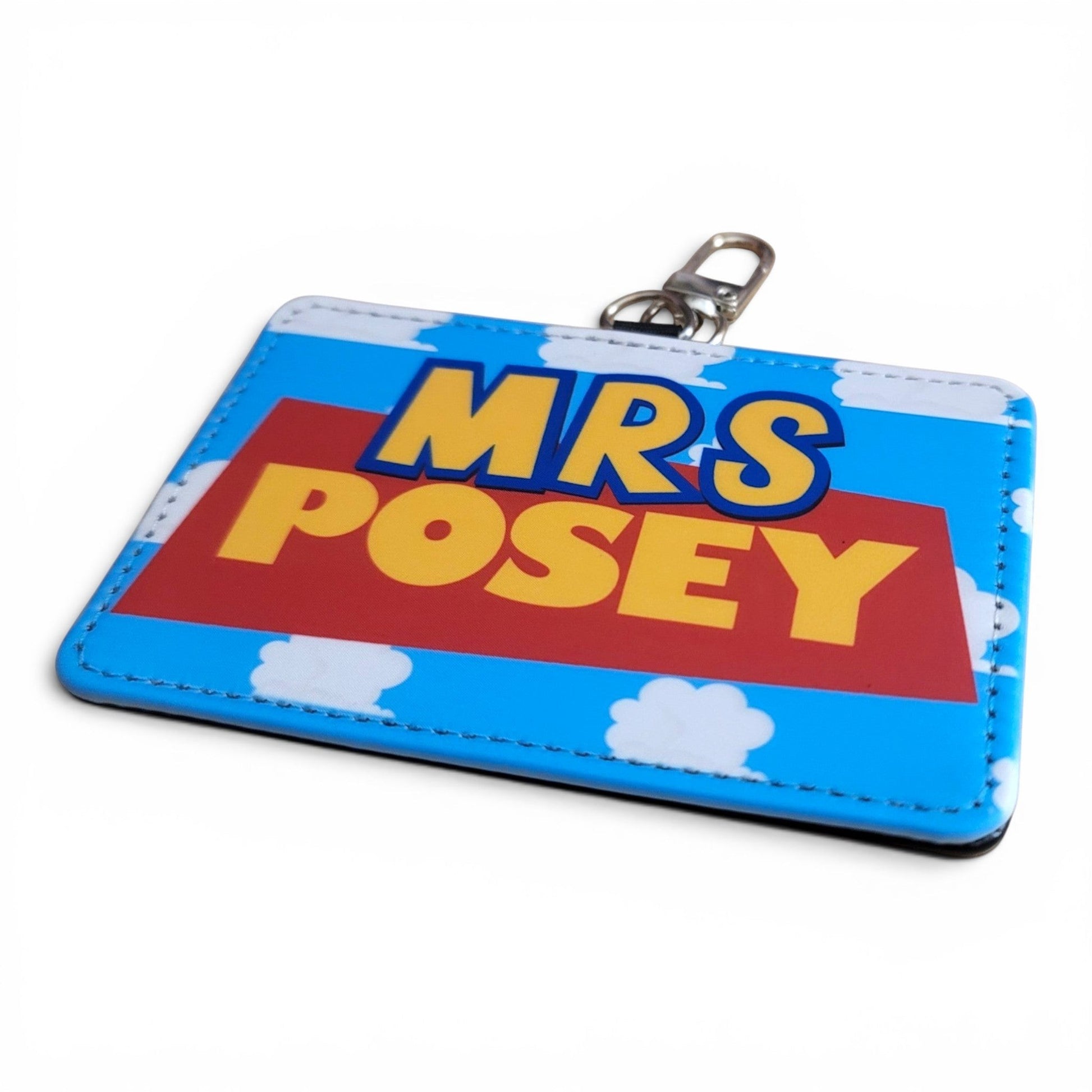 Mommie Peas Creations personalized Toy Story inspired ID holder with cloudy sky background and swivel clasp.