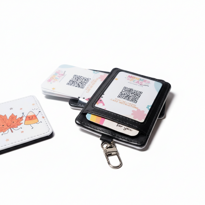 Mommie Peas Creations fall-themed badge holder with black leather trim and cute autumn character illustrations.
