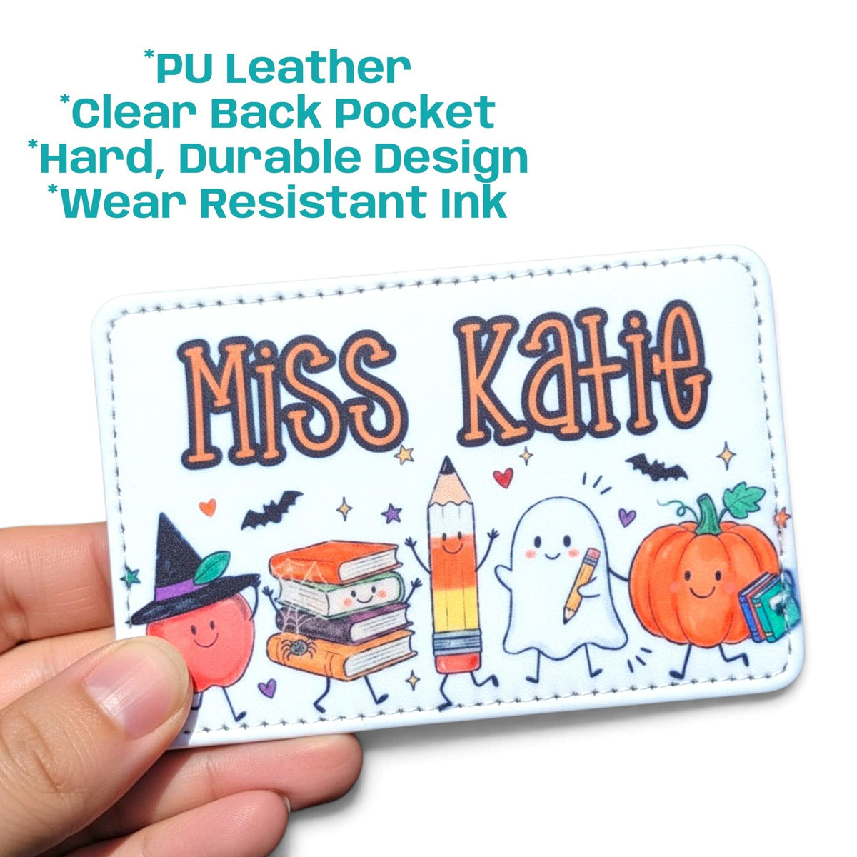 Mommie Peas Creations personalized Halloween teacher ID badge holder in white PU leather with ghost and pumpkin art.