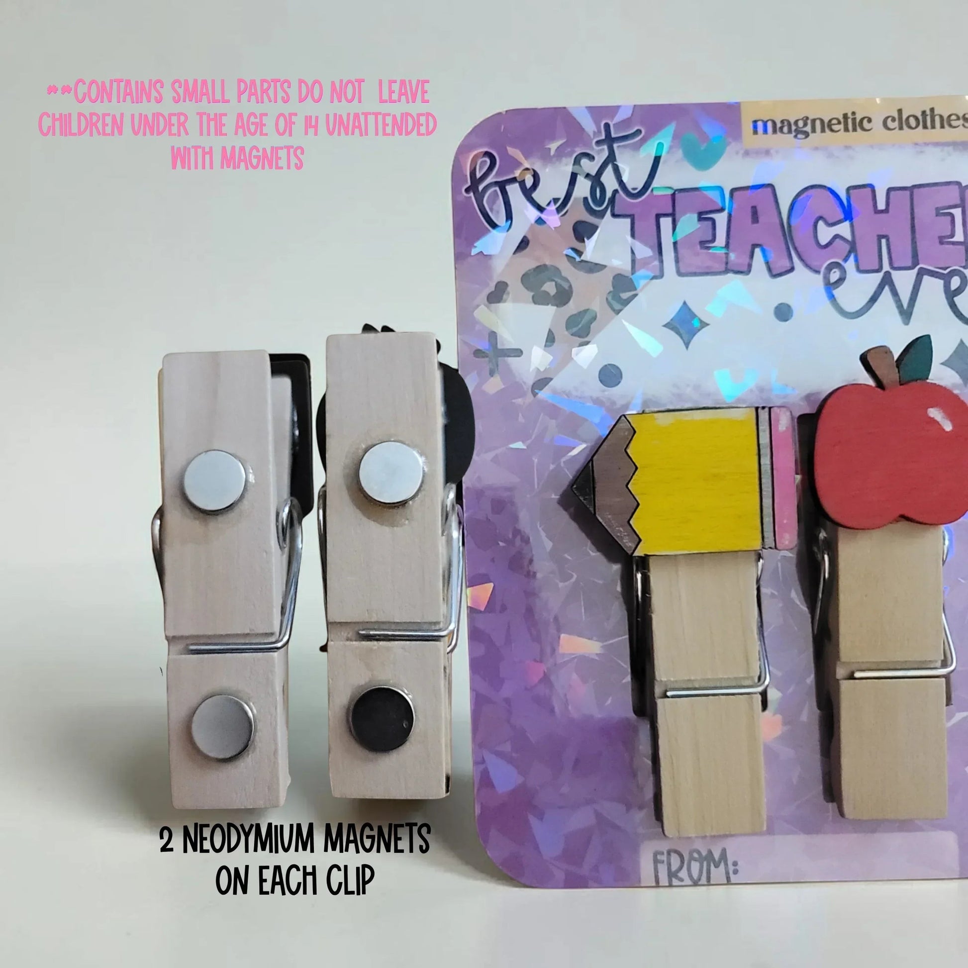 Mommie Peas Creations hand-painted wooden magnetic clothespins with apple and pencil designs. Two neodymium magnets on each clip.