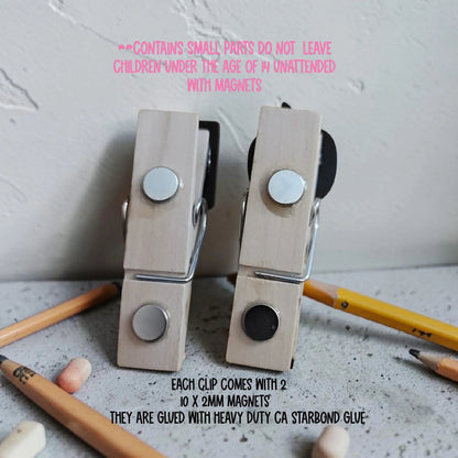 Mommie Peas Creations wooden magnetic clothespins with silver and black magnets, perfect for classroom organization.