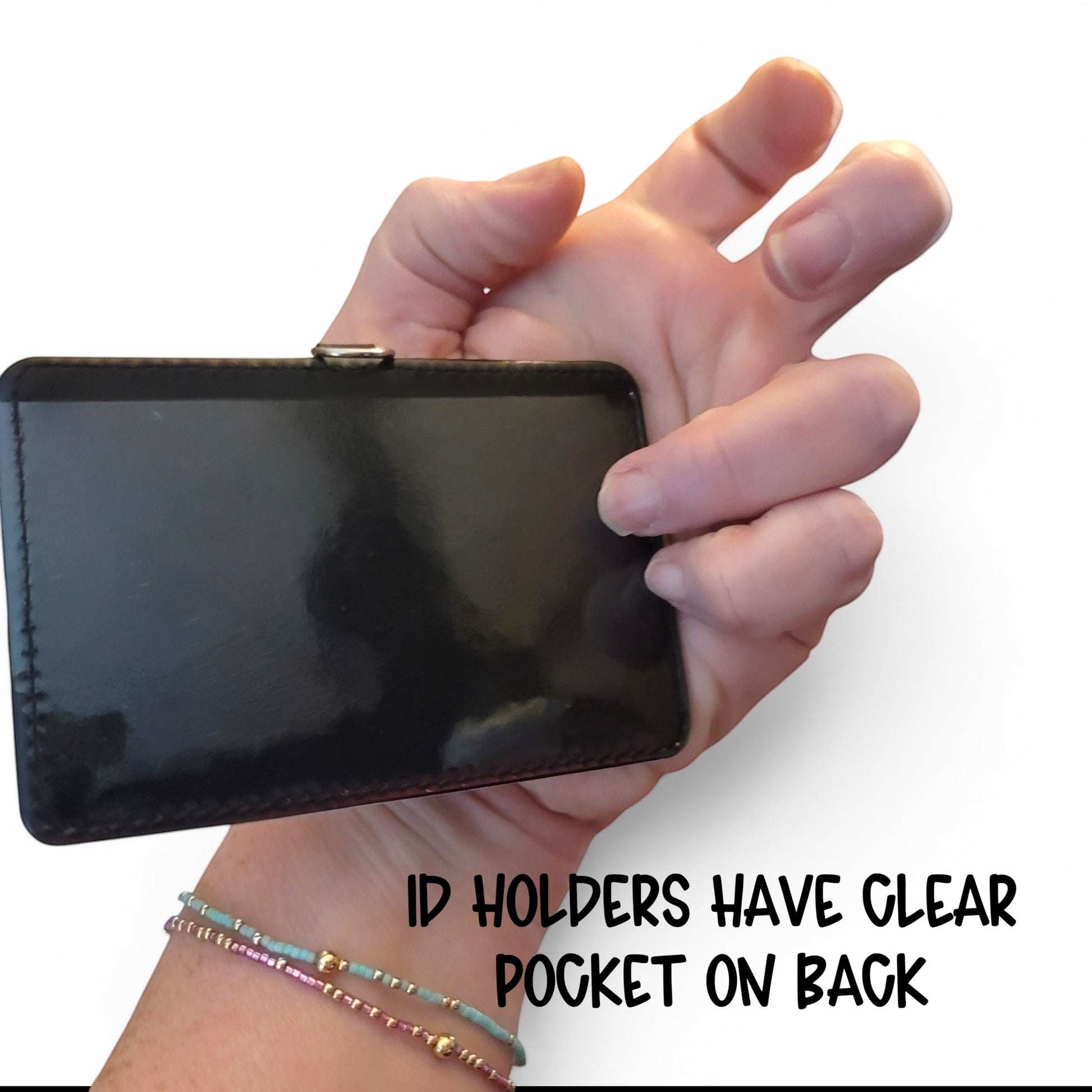 Mommie Peas Creations personalized ID holder with a clear back pocket held in a hand, showing durable PU leather.