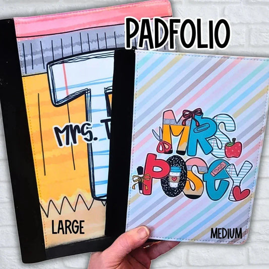Mommie Peas Creations personalized teacher padfolios in large and medium sizes. The large padfolio features a pencil design with "Mrs. T" personalization. The medium padfolio has a striped background with "Mrs. Posey" personalization.