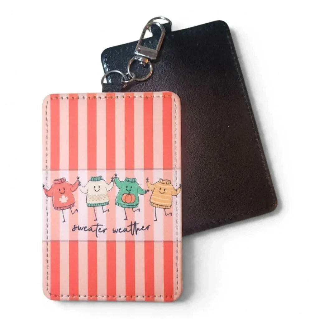 Handmade red and pink striped Mommie Peas Creations badge holder with cute sweater characters.