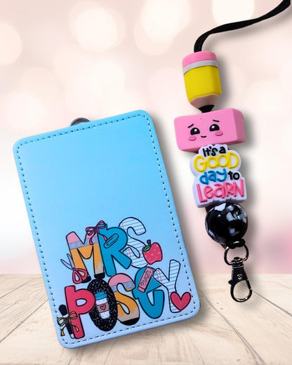 Mommie Peas Creations personalized light blue faux leather teacher ID badge holder with matching pencil bead lanyard