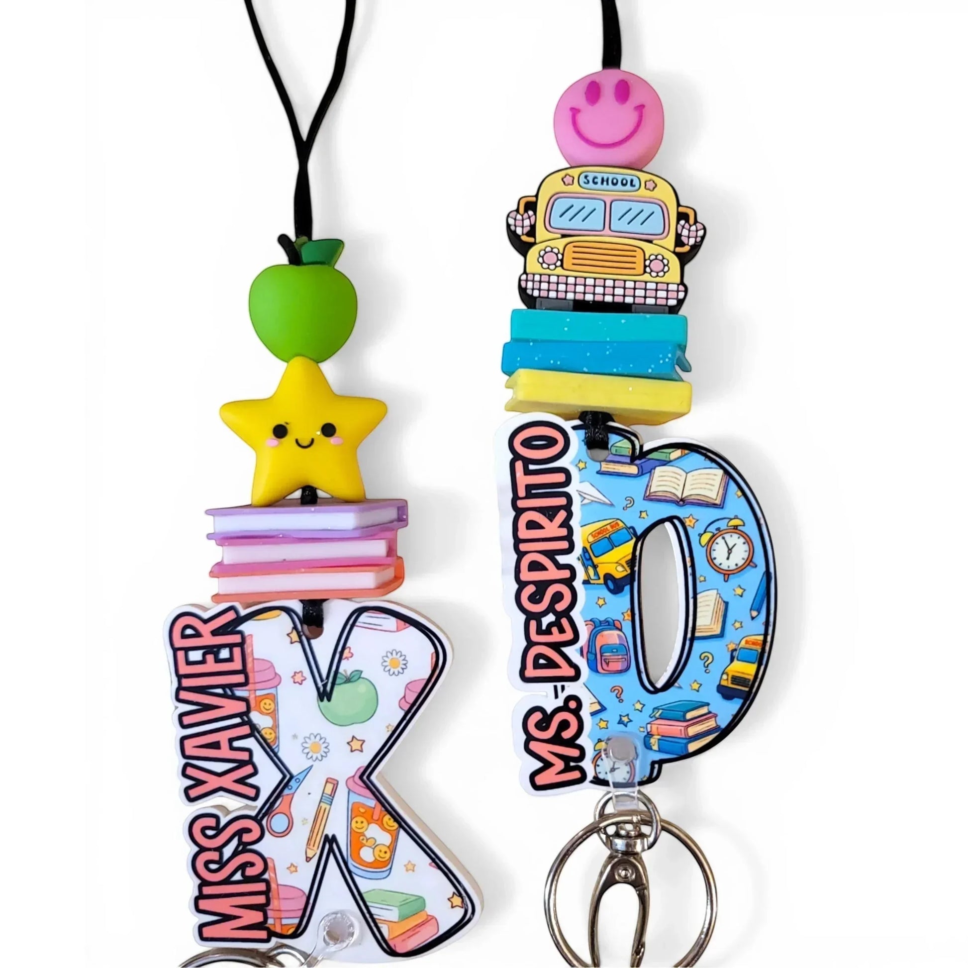 Colorful handmade teacher lanyards with personalized names, school bus, apple, star, and books from Mommie Peas Creations