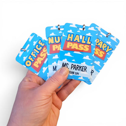 Mommie Peas Creations personalized metal classroom hall passes with a blue sky and white cloud Toy Story design.