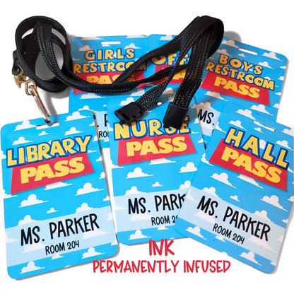 Mommie Peas Creations personalized metal classroom hall passes with Toy Story inspired blue sky and cloud design.