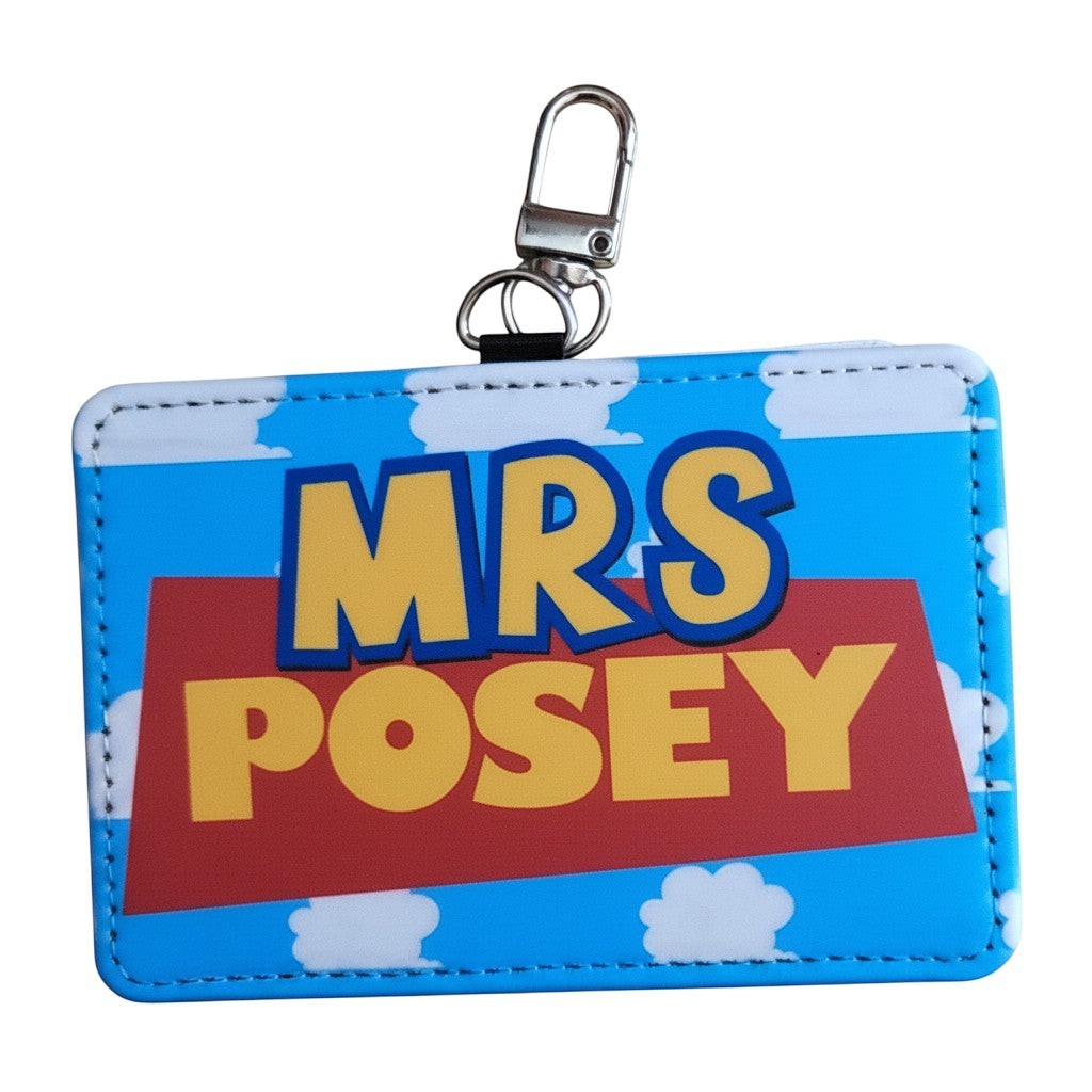 Mommie Peas Creations personalized Toy Story inspired ID holder with blue cloudy sky background and swivel clasp.