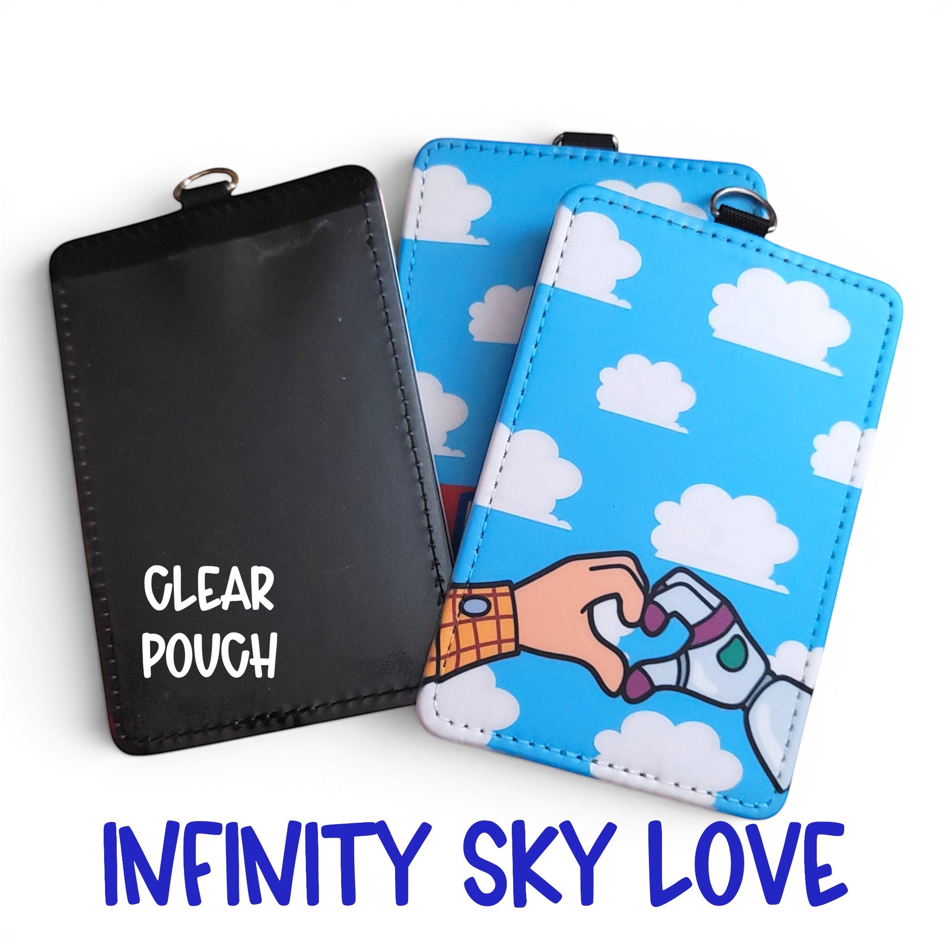 Mommie Peas Creations Toy Story inspired ID holder with Woody and Buzz hands forming a heart on a cloudy sky print.