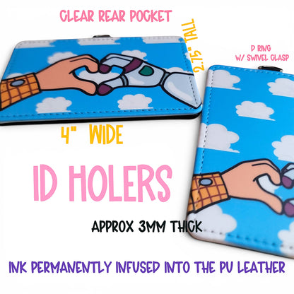 Mommie Peas Creations Toy Story inspired PU leather ID holder with Woody and Buzz heart hands on a cloudy sky print.