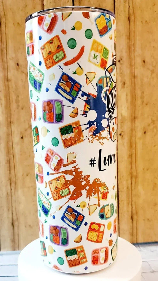 Mommie Peas Creations white stainless steel tumbler with a colorful all-over print of lunch boxes, food items, and the hashtag LunchLadyLife.