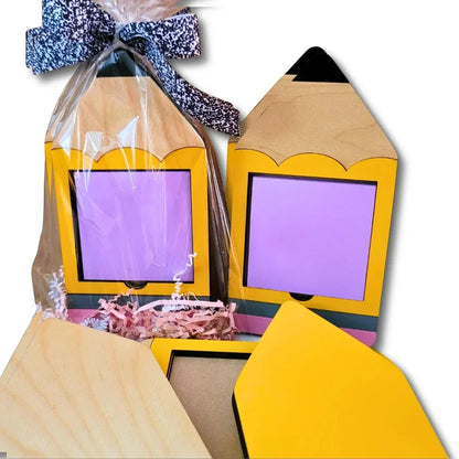 Mommie Peas Creations yellow wooden pencil Post-it note holder with purple insert, gift-wrapped with black and white ribbon.