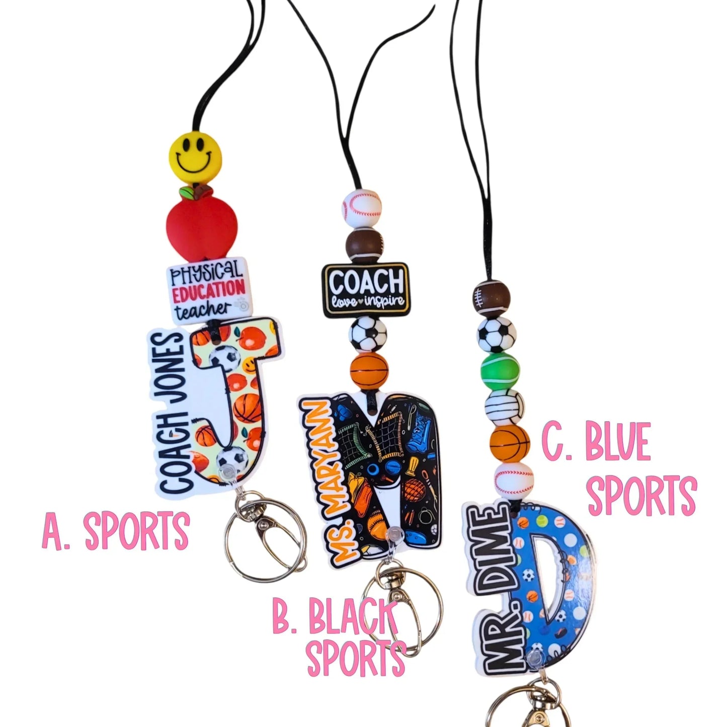 Mommie Peas Creations personalized teacher lanyards with custom acrylic letters and sports-themed beads. Features include a breakaway clasp and durable paracord.