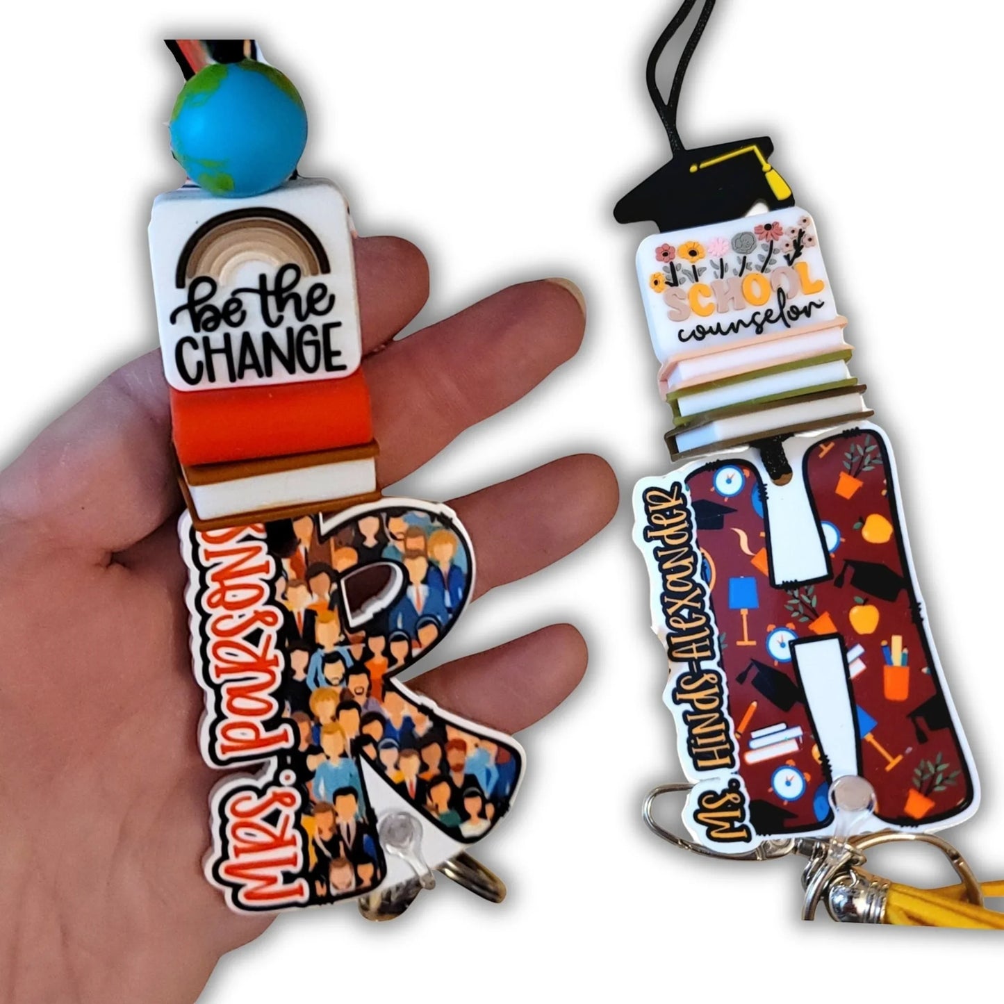 Mommie Peas Creations school counselor lanyards with custom acrylic name plates, colorful beads, and themed charms like books and a globe.