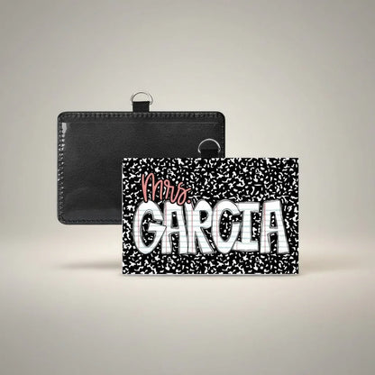 Mommie Peas Creations black leather teacher ID badge holder with a personalized "Mrs. Garcia" insert designed like notebook paper.