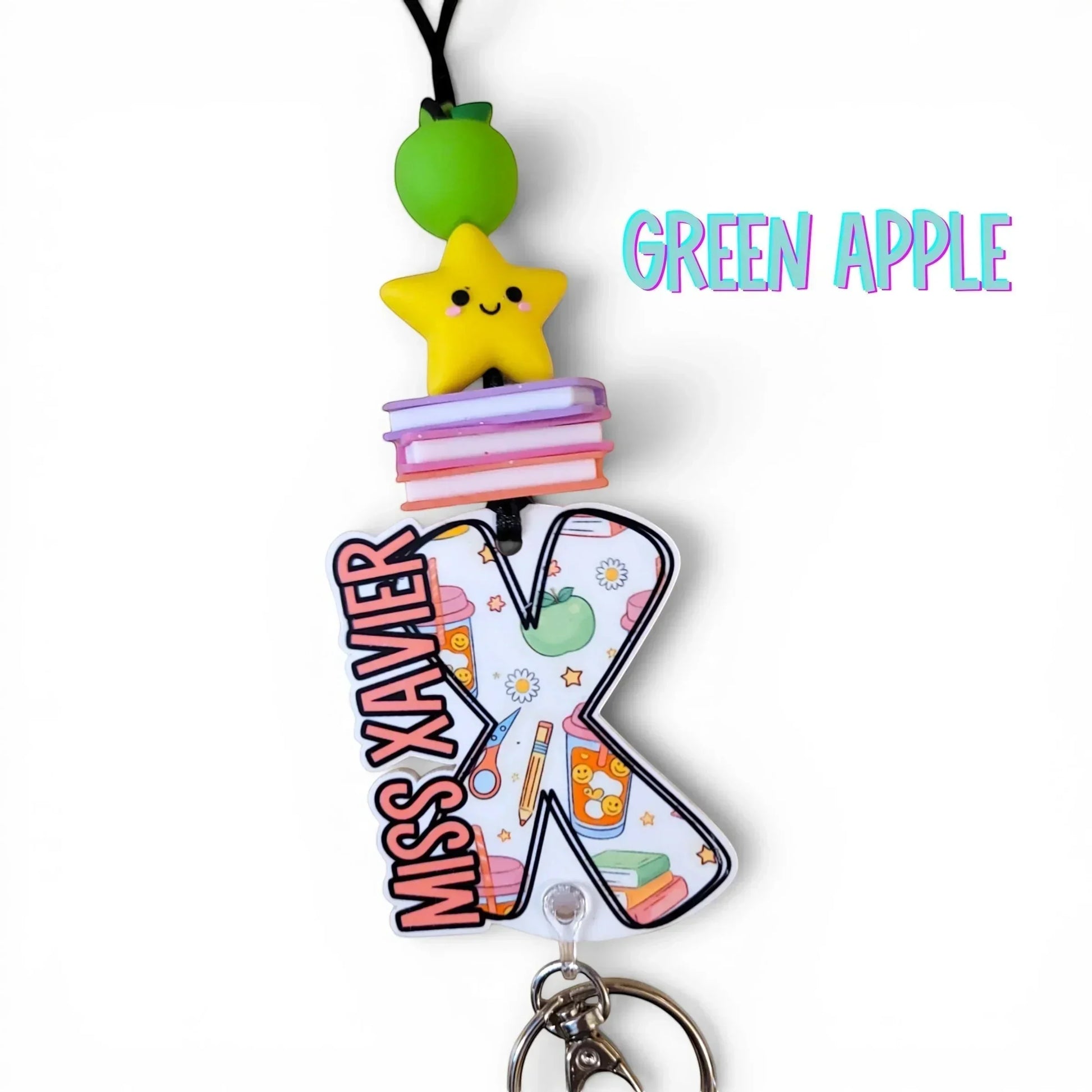 Handmade teacher gift: green apple, yellow star, books on personalized 'Miss Xavier' lanyard with colorful charms