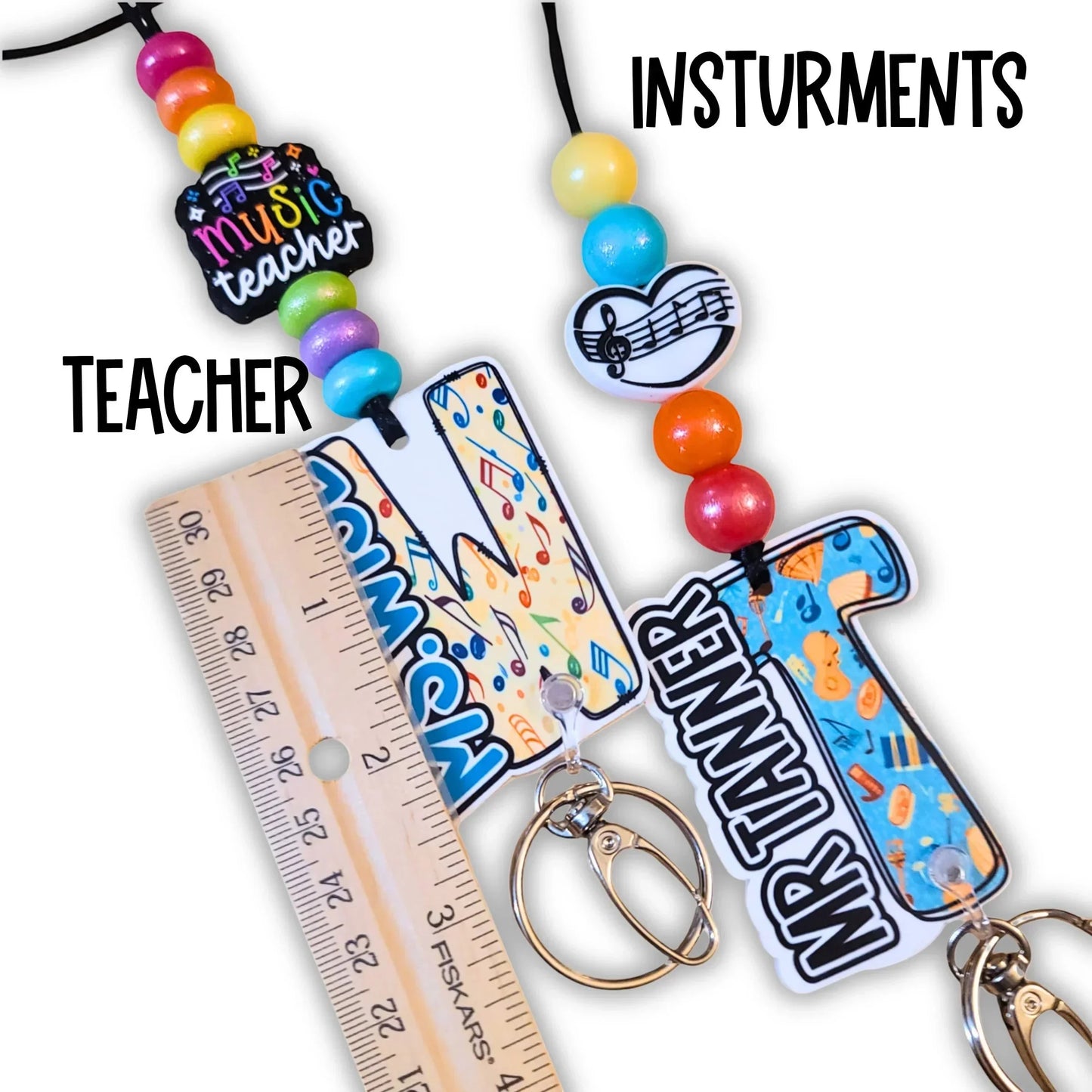 Mommie Peas Creations personalized teacher lanyard with colorful silicone beads, music notes, and custom acrylic charms for Mr. Tanner.