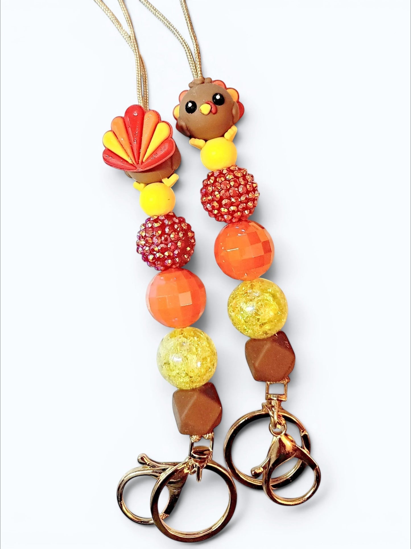 Mommie Peas Creations Thanksgiving turkey beaded lanyard with fall colors, gold hardware, and breakaway clasp.