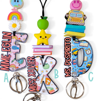Colorful handmade teacher lanyard gift keychains with bright charms and school-themed letters
