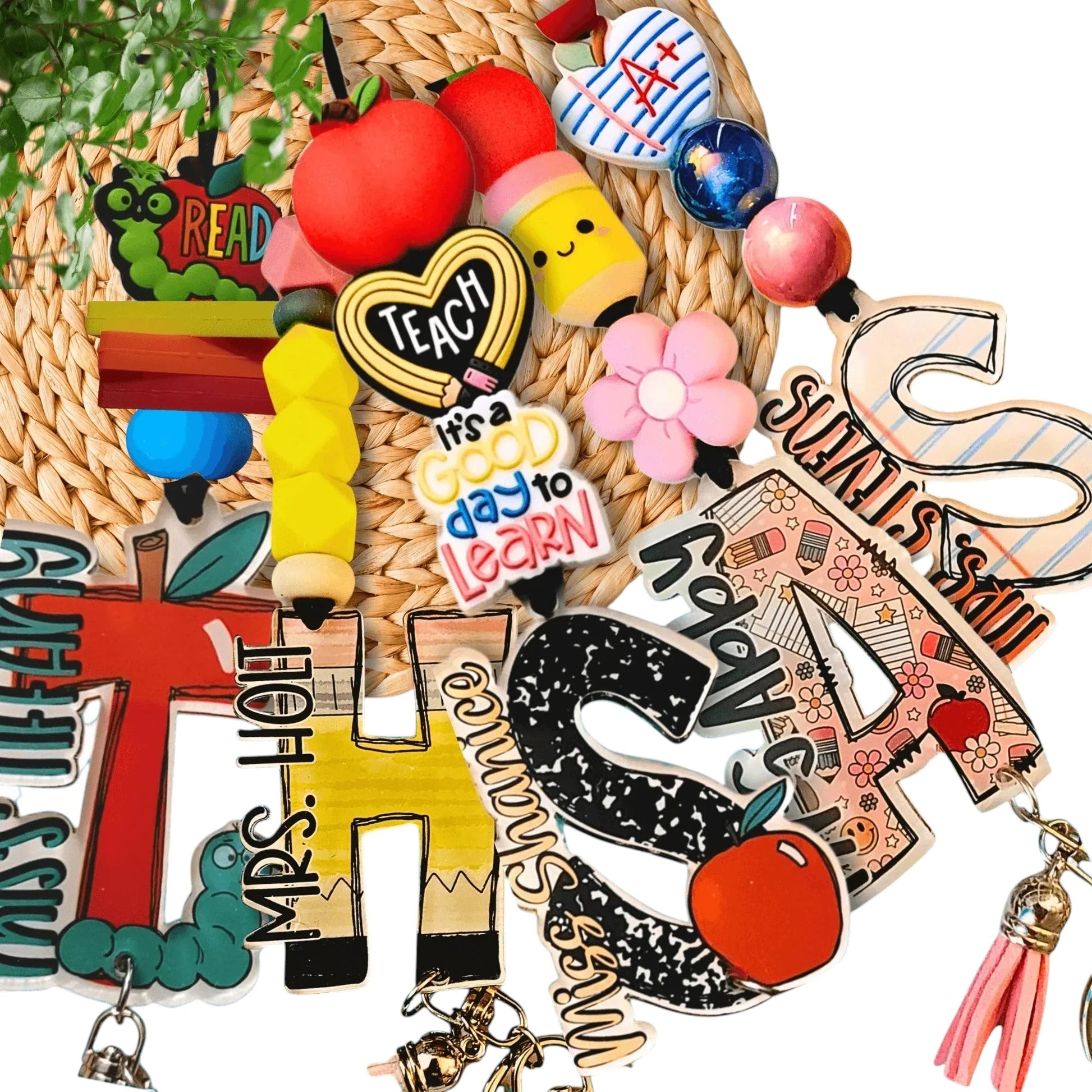 Colorful handmade teacher-themed gifts with apples, pencils, hearts, and floral designs.